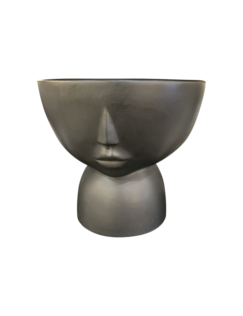Black face vase on stand